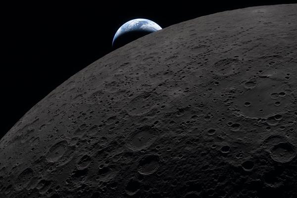 A view of the Earth setting behind the Moon