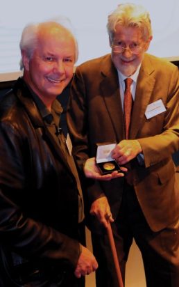 Sir Christopher presents the first Zeeman Medal to Ian Stewart