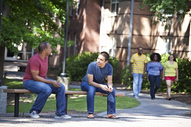students sitting outside