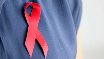 Wearing-a-red-ribbon-for-World-AIDS-Day