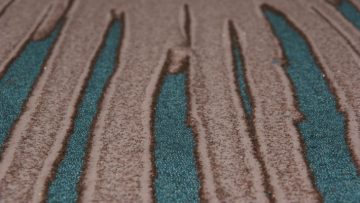 A series of leveed fingers that have been triggered by a segregation induced instability.