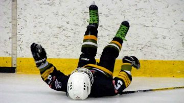 person sliding on the ice