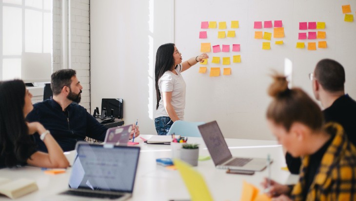 A group of people working in an office.