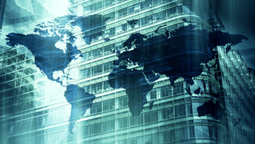 Image of world map over a building