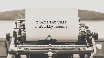 Typewriter with text without vowels